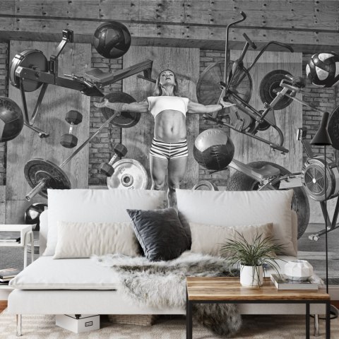 Fototapeta Kobieta Lewitująca Między Sprzętem Sportowym Flizelina 208x146 FT-3952-VEXL