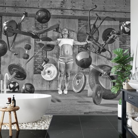 Fototapeta Kobieta Lewitująca Między Sprzętem Sportowym Flizelina 208x146 FT-3952-VEXL