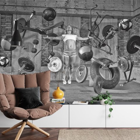 Fototapeta Kobieta Lewitująca Między Sprzętem Sportowym Vinyl Gładki 152.5x104 FT-3952-VGL