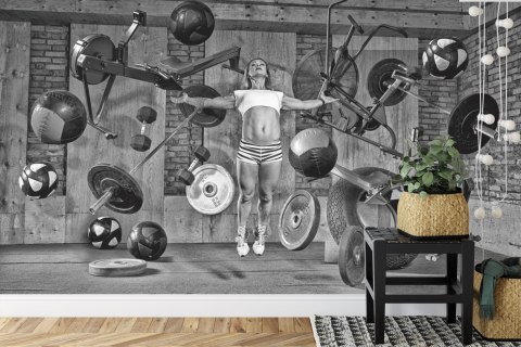 Fototapeta Kobieta Lewitująca Między Sprzętem Sportowym Vinyl Gładki 152.5x104 FT-3952-VGL