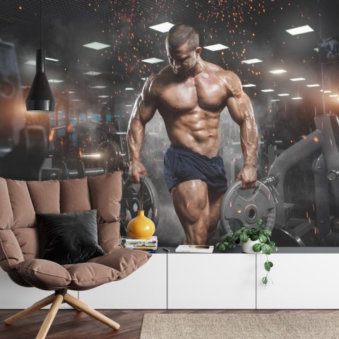 Fototapeta Umięśniony Mężczyzna Na Siłowni Vinyl Gładki 152.5x104 FT-3944-VGL