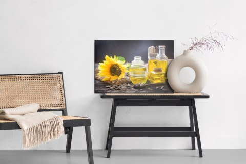 Obraz Na Płótnie Buteleczki Z Olejem Słonecznikowym Canvas Naturalny 100x70 LB-726-NC100-70